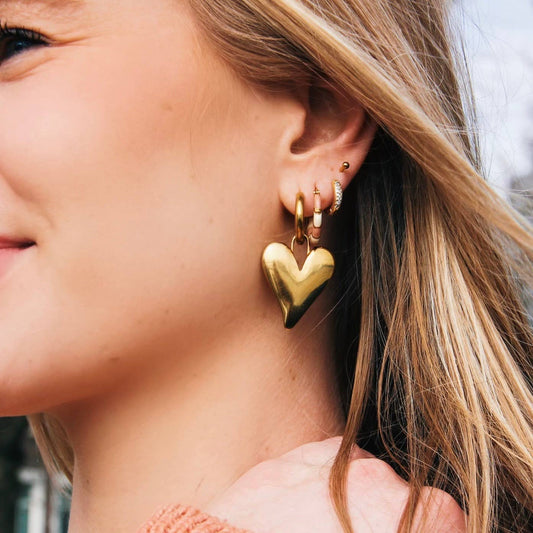 Stainless steel wide hoop earring with XL closed heart -gold