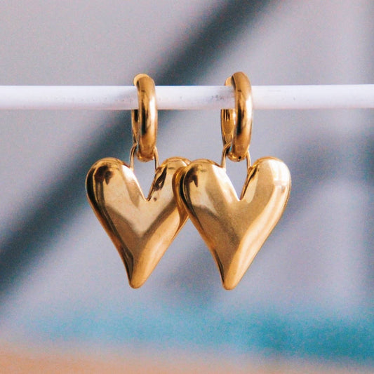 Stainless steel wide hoop earring with XL closed heart -gold