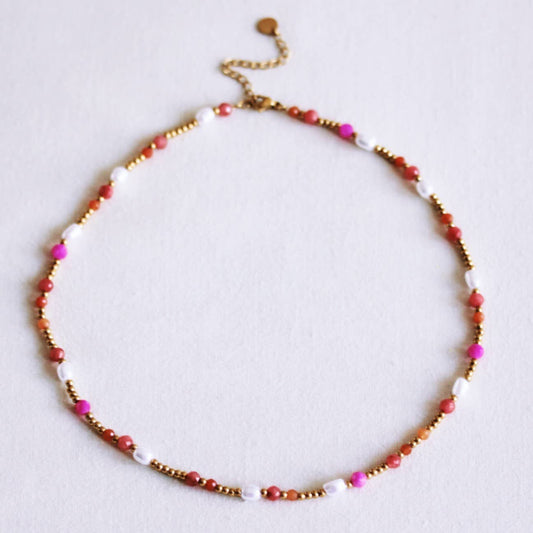 Beaded necklace with pearls and facets - coral/orange/pink