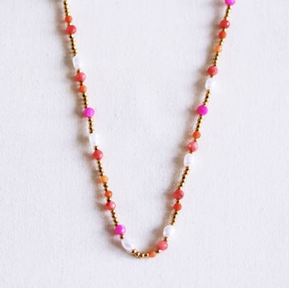 Beaded necklace with pearls and facets - coral/orange/pink