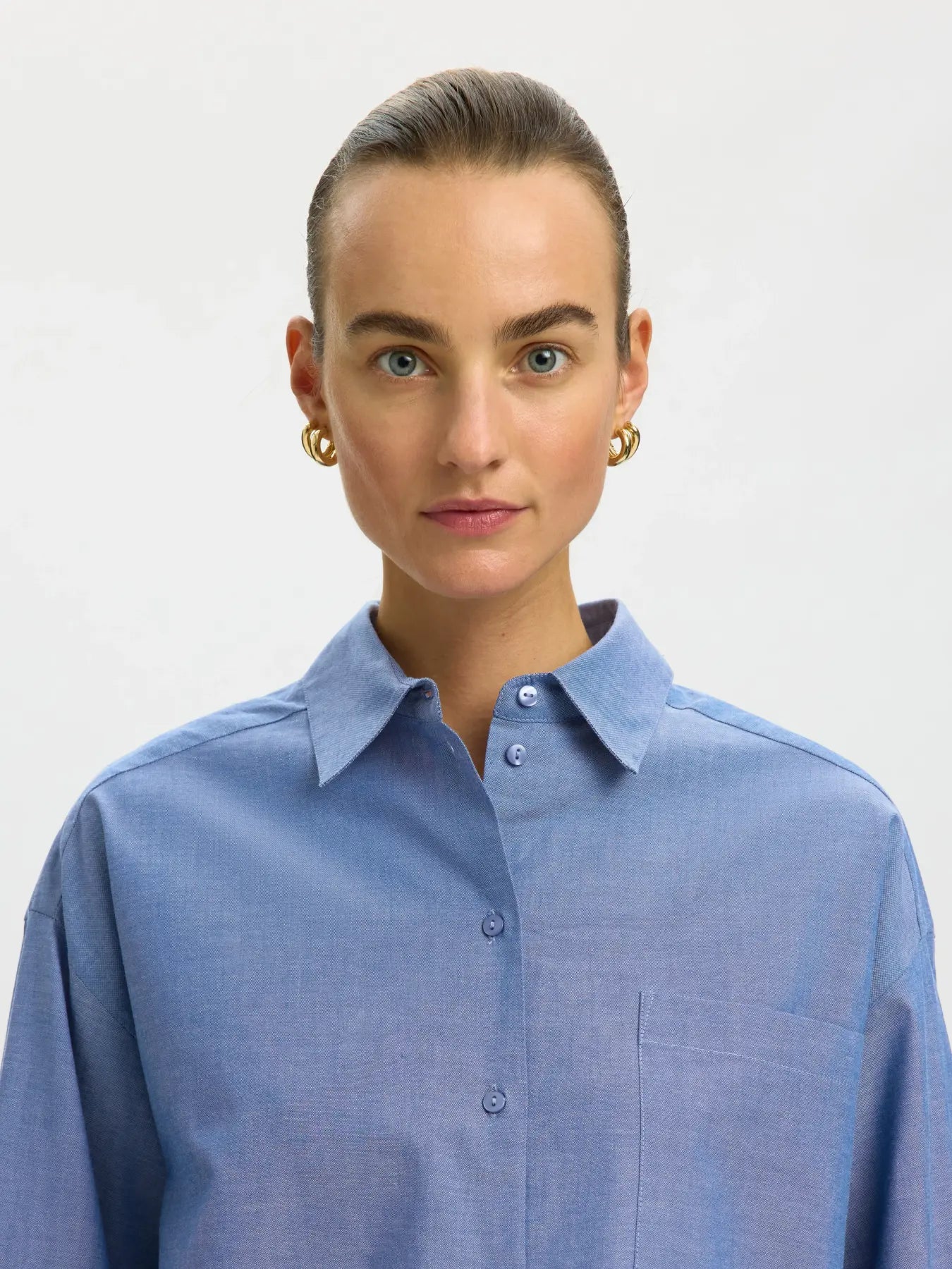relaxed_fit_blue_cropped_shirt