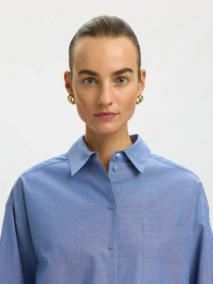 relaxed_fit_blue_cropped_shirt